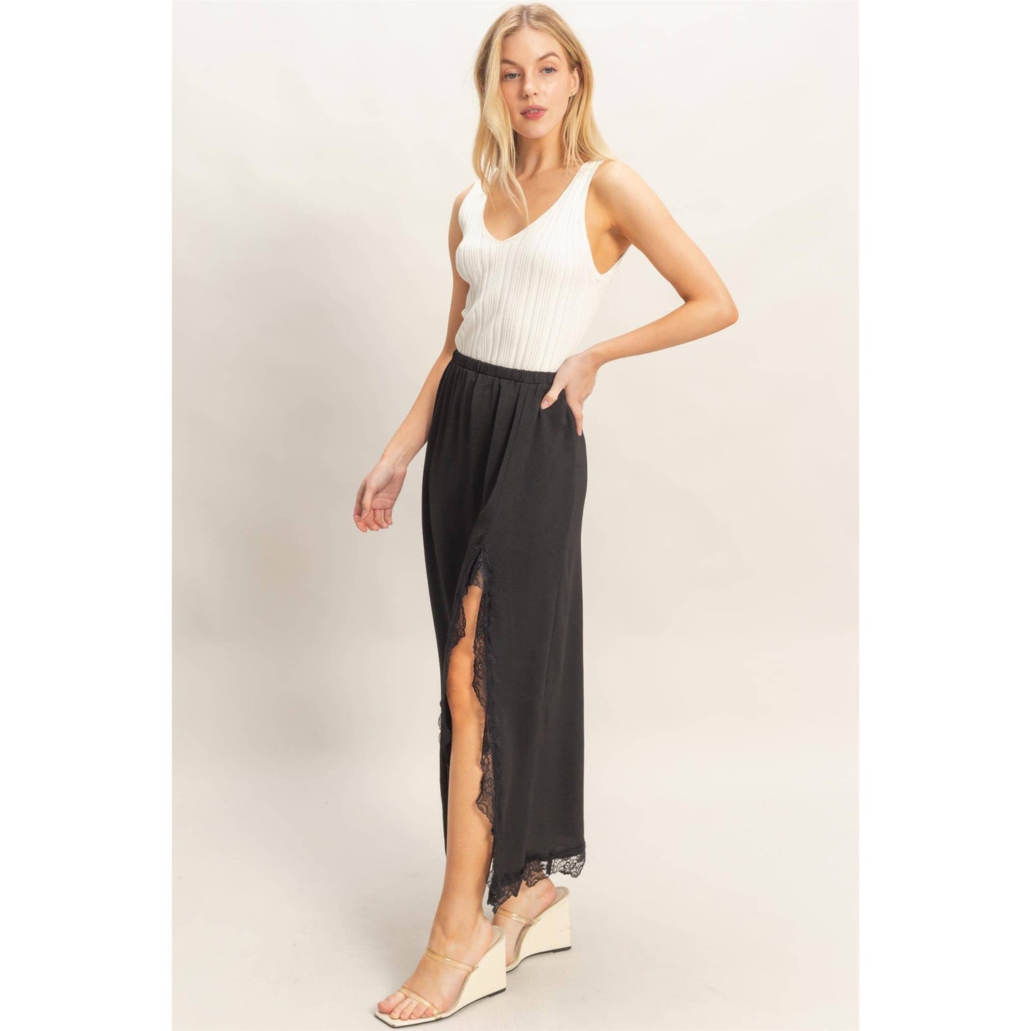 Black Skirt With Front Slit And Lace Hem