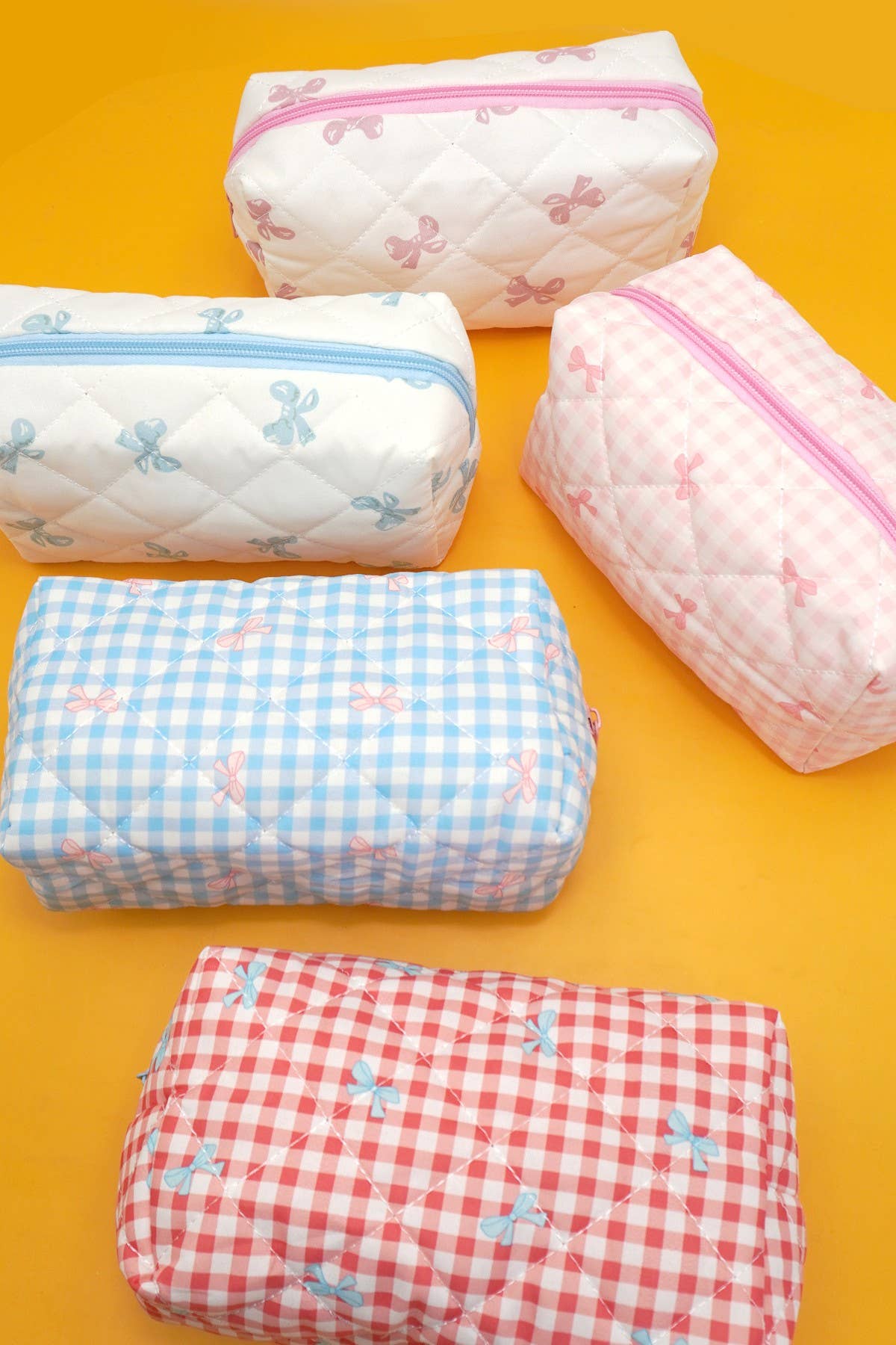 QUILTED COTTON CHECKER BOW COSMETIC POUCH BAG | 40P569